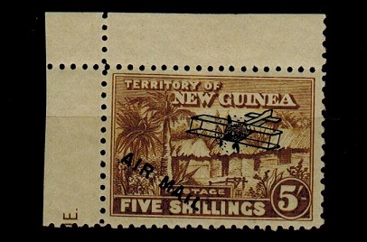 NEW GUINEA - 1931 5/- olive bistre  mint showing the variety SHORT I IN MAIL variety.  SG 147.
