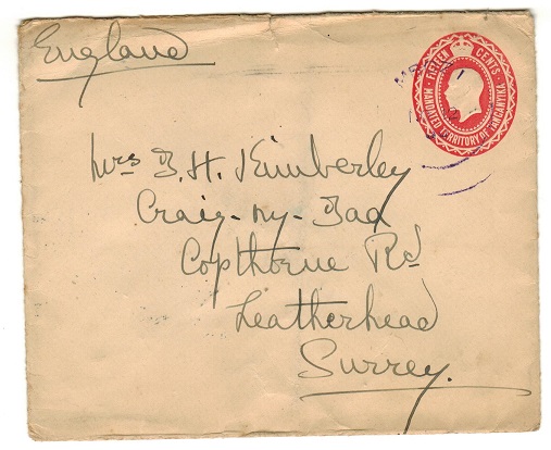 TANGANYIKA - 1927 15c red PSE addressed to UK used at MBOZI and struck in violet ink.  H&G 2.
