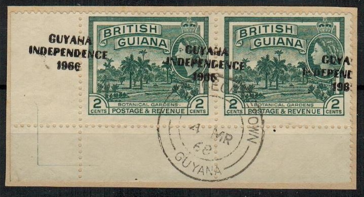 BRITISH GUIANA - 1968 2c myrtle green overprint pair on piece with GROSSLY MISPLACED OVERPRINT.