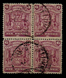 RHODESIA - 1898 6d reddish purple used block of four. SG 83.