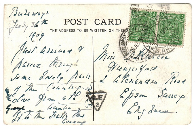 RHODESIA - 1909 1/2d pair used on postcard to UK at BULAWAYO STATION.