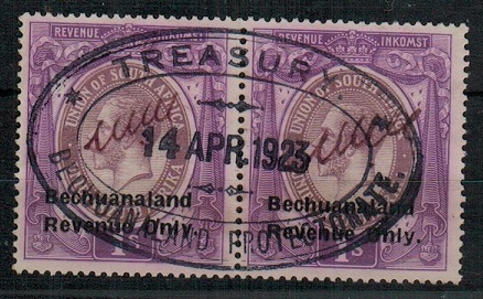 BECHUANALAND - 1923 1/- violet REVENUE pair used at the Treasury.