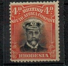 RHODESIA - 1913 4d black and orange red 