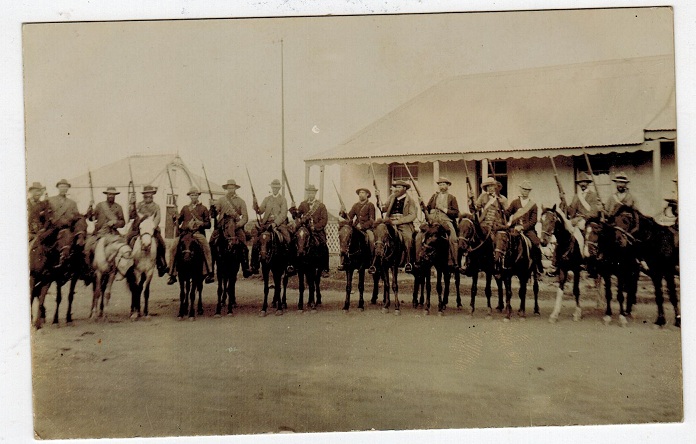 TRANSVAAL - 1900 (circa) real photo picture postcard depicting 16 Boer troops.
