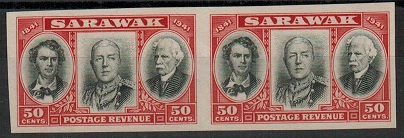 SARAWAK - 1946 50c IMPERFORATE PLATE PROOF pair in black and scarlet.